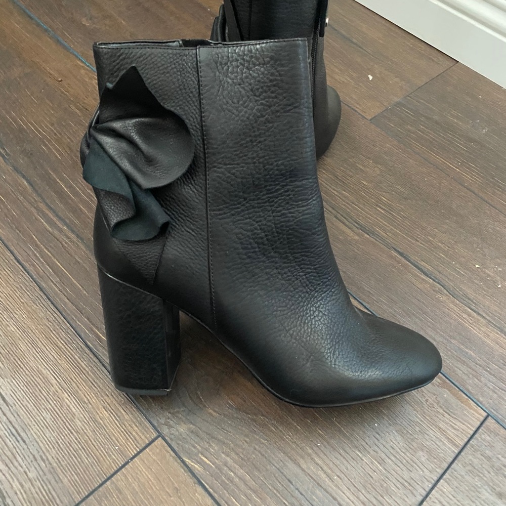 A Story Told By Joyce Azria Black Leather Booties